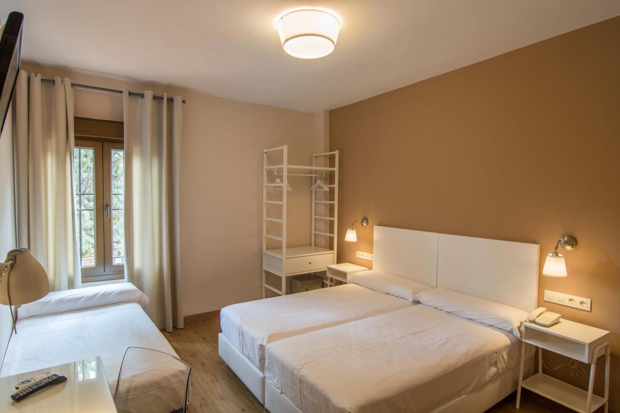 Habitación Doble con cama supletoria (3 adultos)