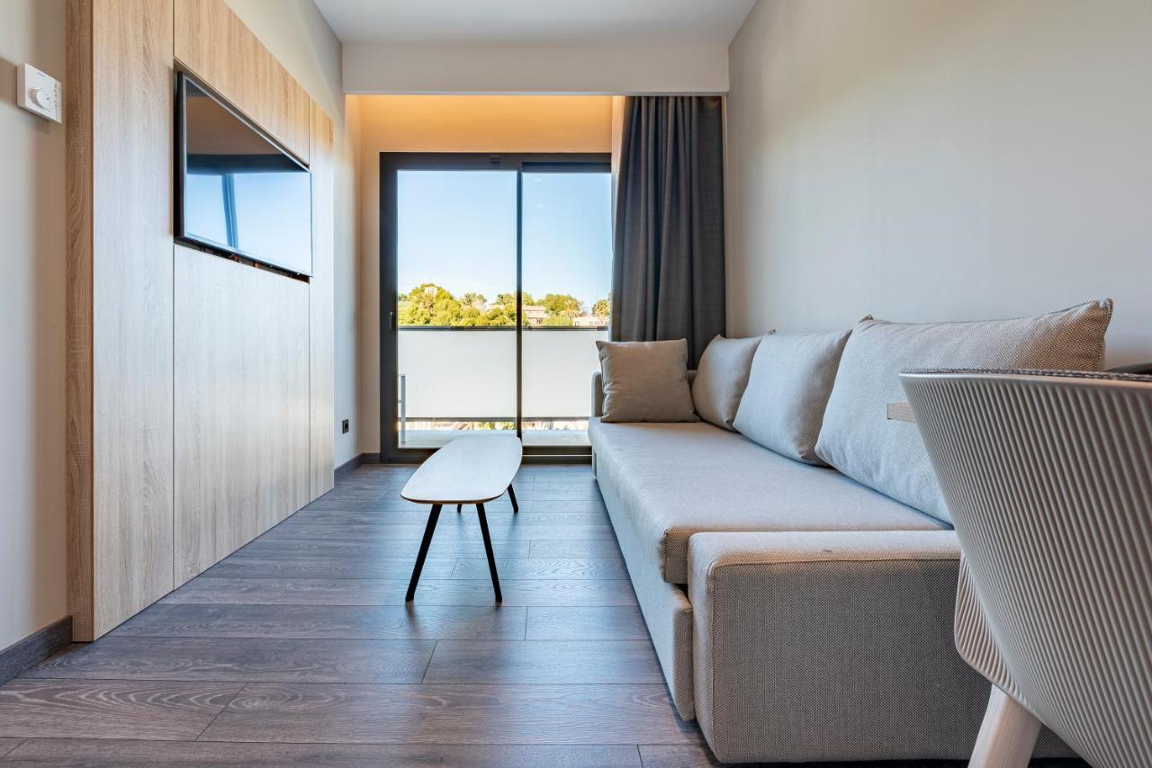 Habitación Familiar con balcón y vistas a la ciudad