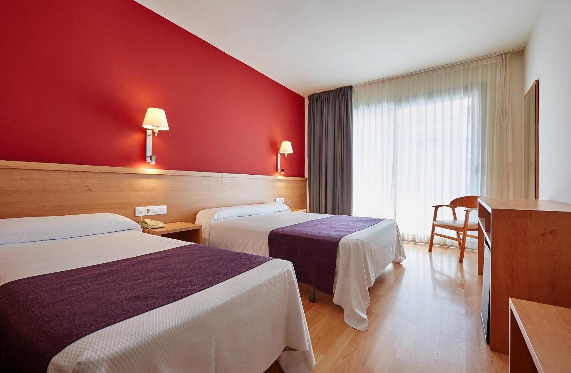 Habitación Doble con cama supletoria (2 adultos + 2 niños)