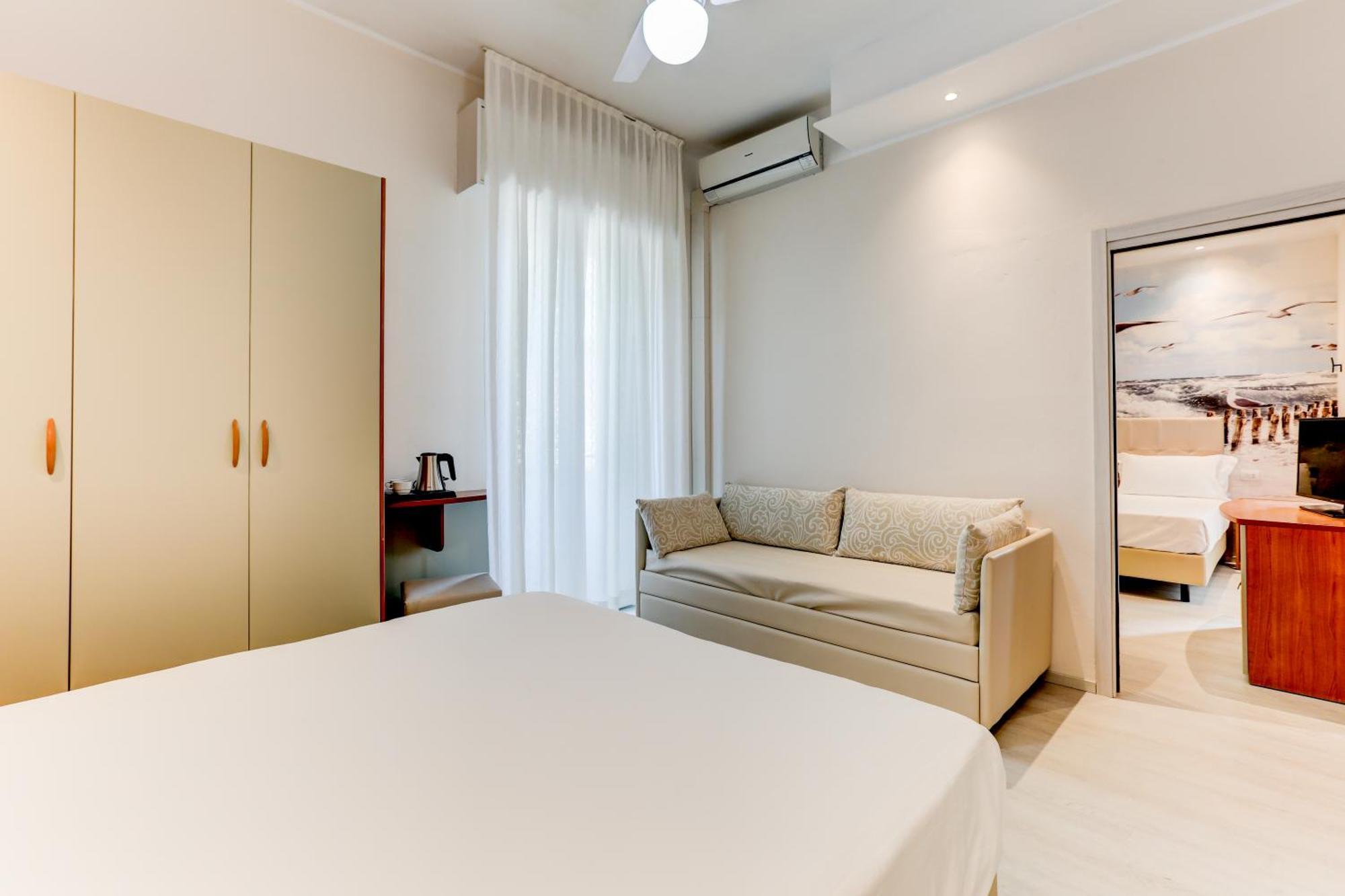 Camera Familiare con Balcone