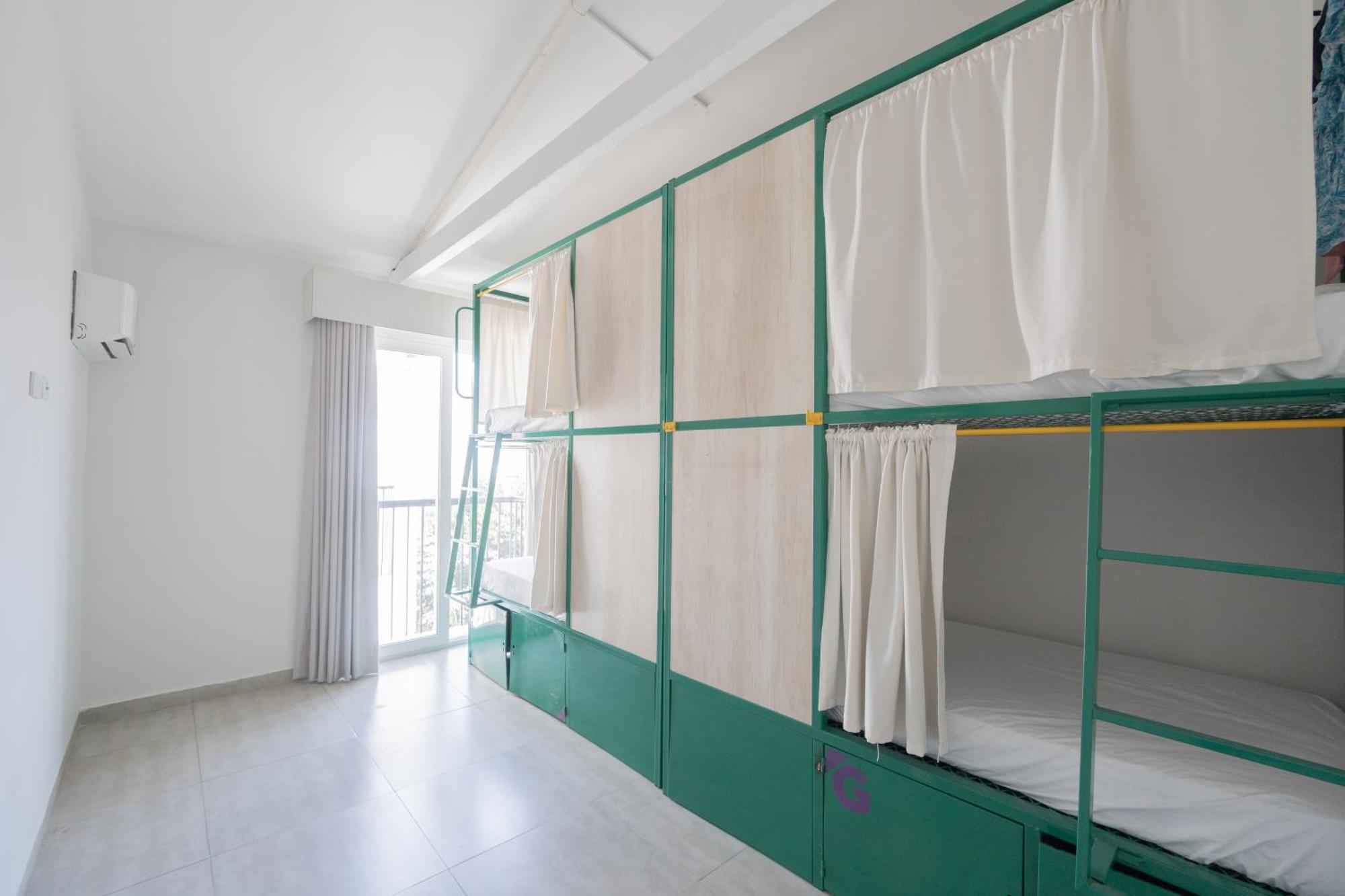 Cama en habitación compartida mixta de 8 camas