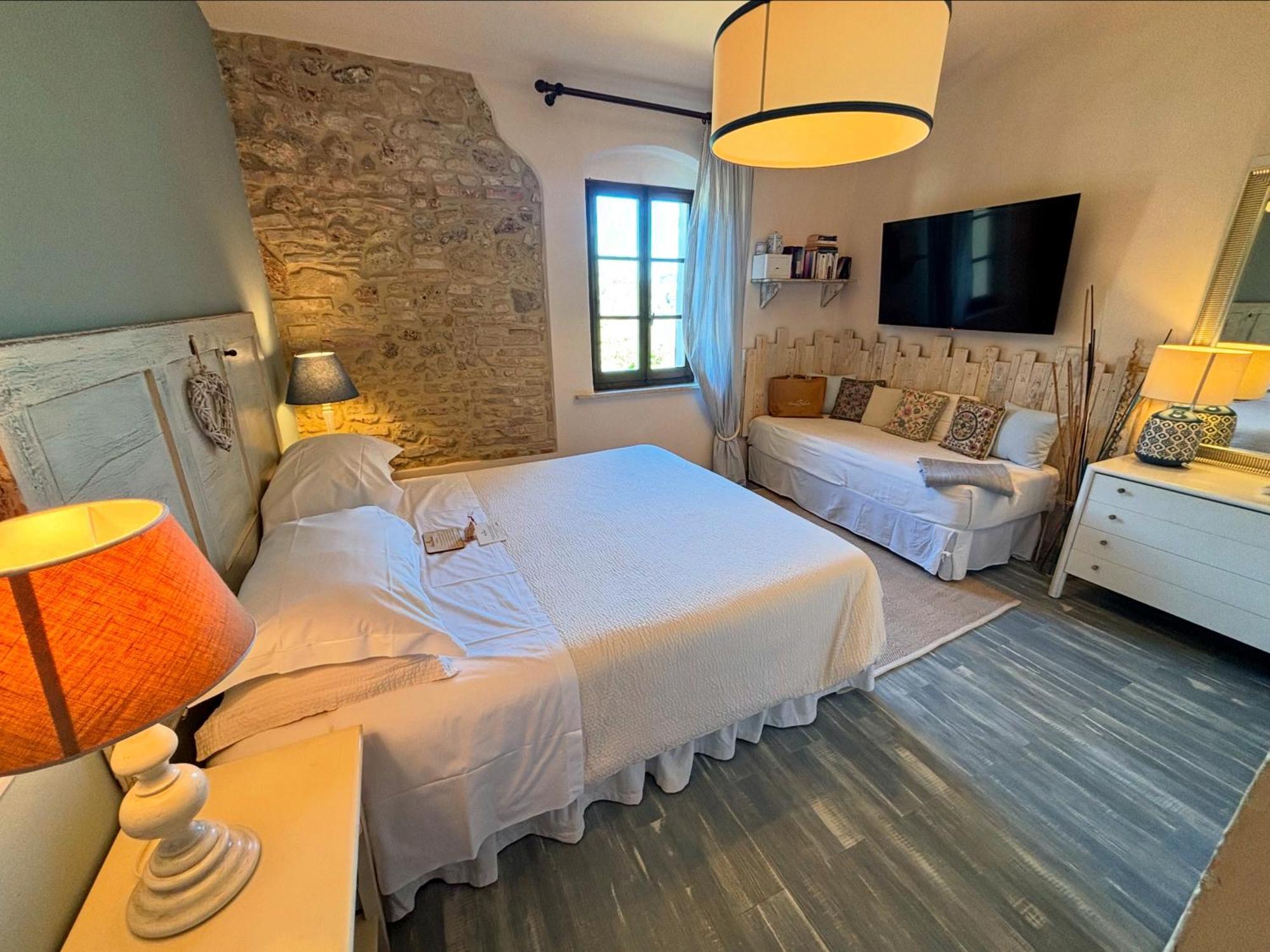 Suite Queen con Vista Piscina