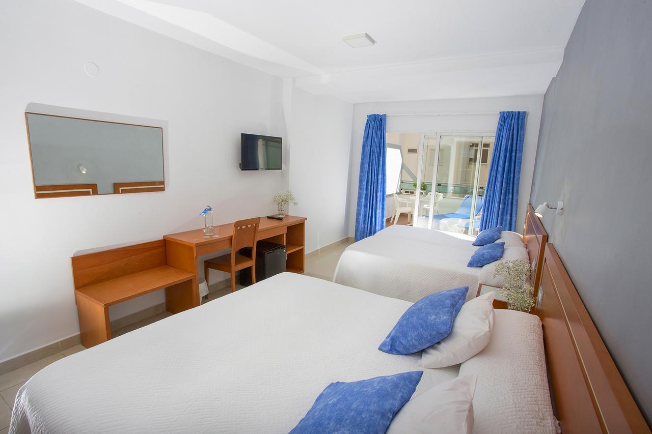 Habitación Cuádruple (2 adultos + 2 niños)